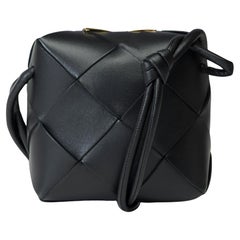 Bottega Veneta Mini Cassette shoulder bag in black lambskin , GHW