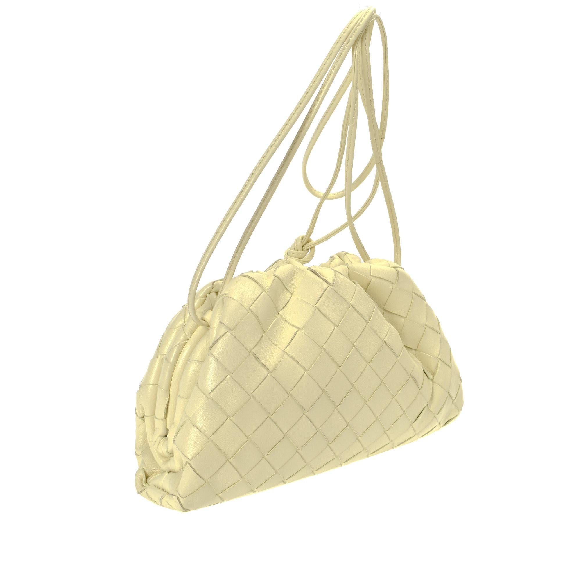 Vintage Bottega Veneta Mini Pouch in soft yellow leather. Perfect for summer! Authenticated by LXRandCo. 
