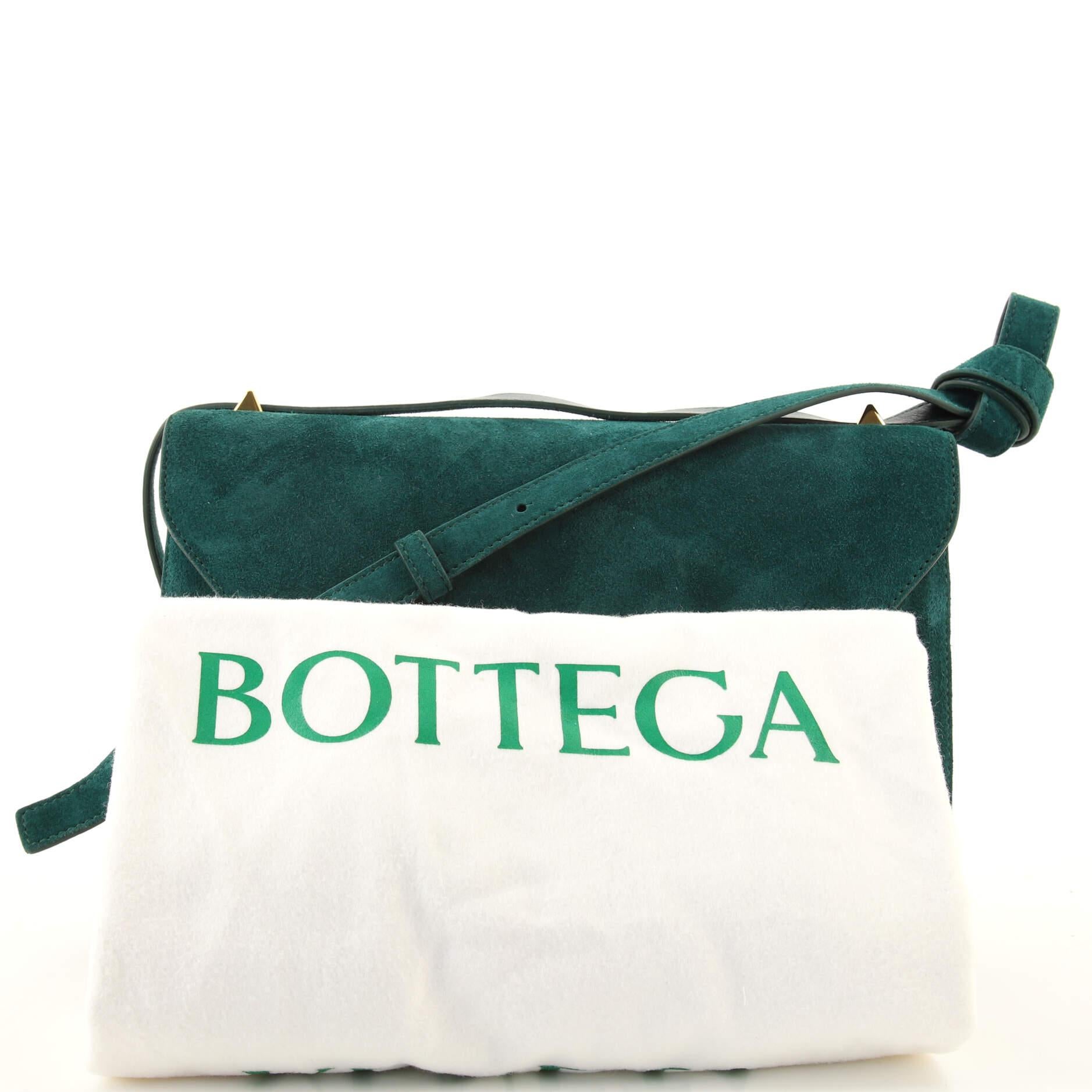 Condition: Very good. Wear and marks on exterior and strap, creasing on strap. Moderate scuffs underneath flap and in interior, scratches on hardware.
Accessories: Dust Bag, With Strap
Measurements: Handle Drop 7