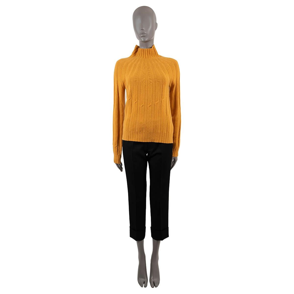 100% authentic Bottega Veneta 2016 sun ray sweater in mustard rib knit cashmere (100%). Features a mock neck, small twist details and rib knit cuffs and hem. Unlined. Has been worn and is in excellent condition.

Measurements
Model	472723
Tag