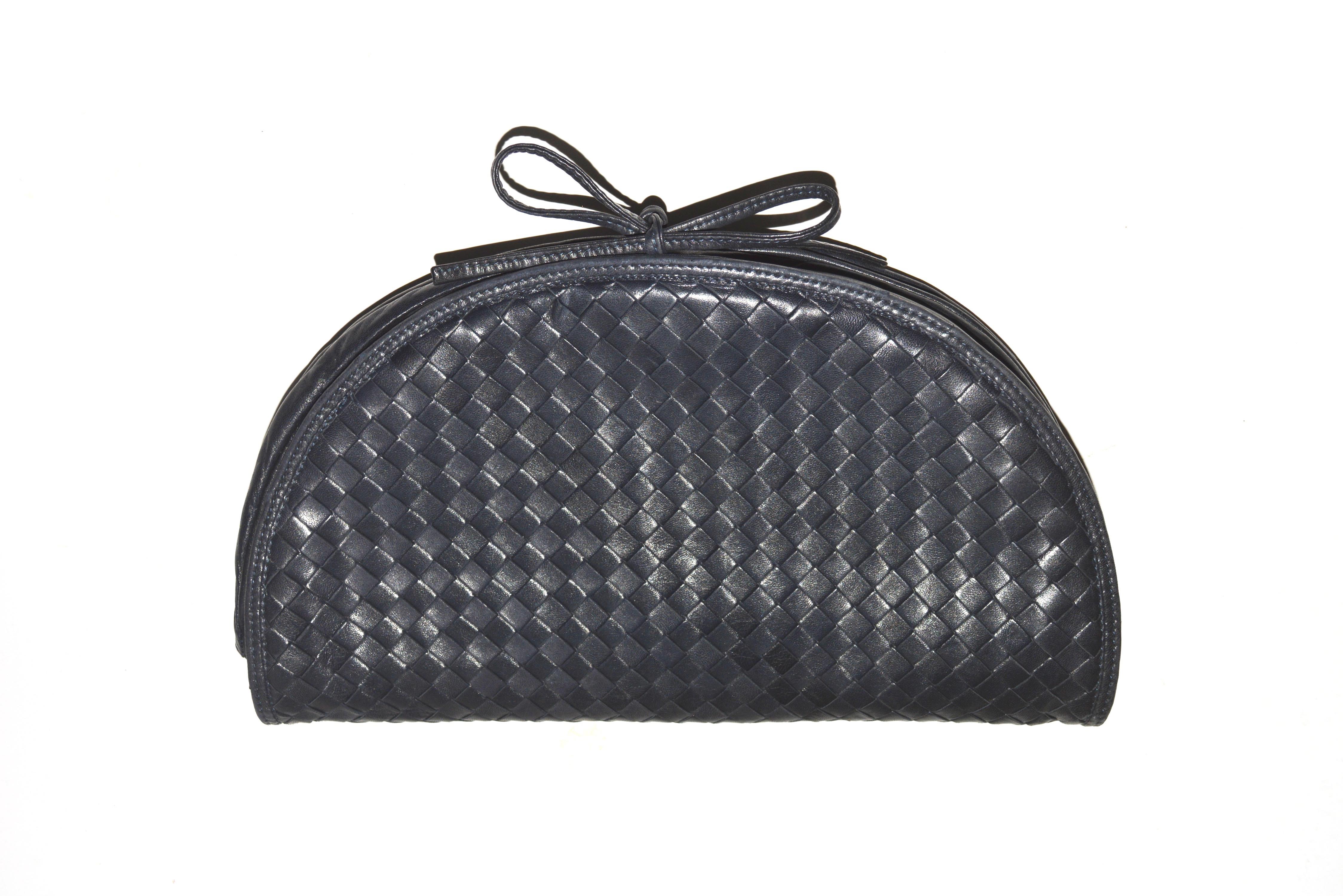 Dark navy woven Bottega Veneta bag with expandable option on the bottom. Clean inside.  13