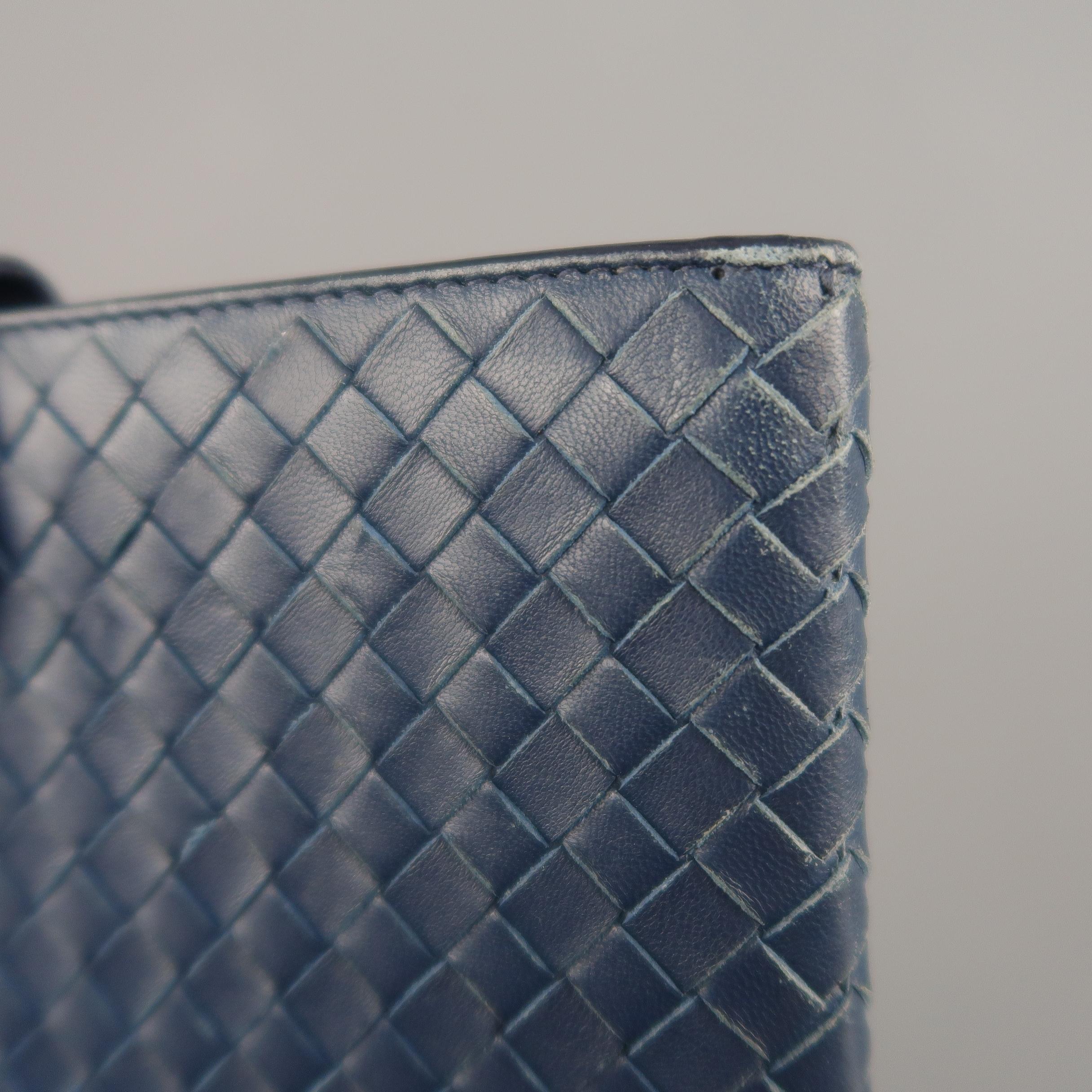 BOTTEGA VENETA tablet case comes in light navy blue woven Intrecciato leather with a snap tab top closure and taupe fabric interior. Made in Italy.
 
Good Pre-Owned Condition.
 
10.5 x 8 in.