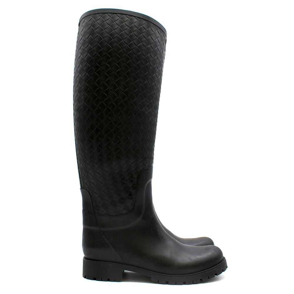 Bottega Veneta Nero Intrecciato Rubber Rainboot

Flared shaft 
Treaded sole
Cross stitch detailing
Rubber sole
Below the knee length
Round toe

Please note, these items are pre-owned and may show some signs of storage, even when unworn and unused.