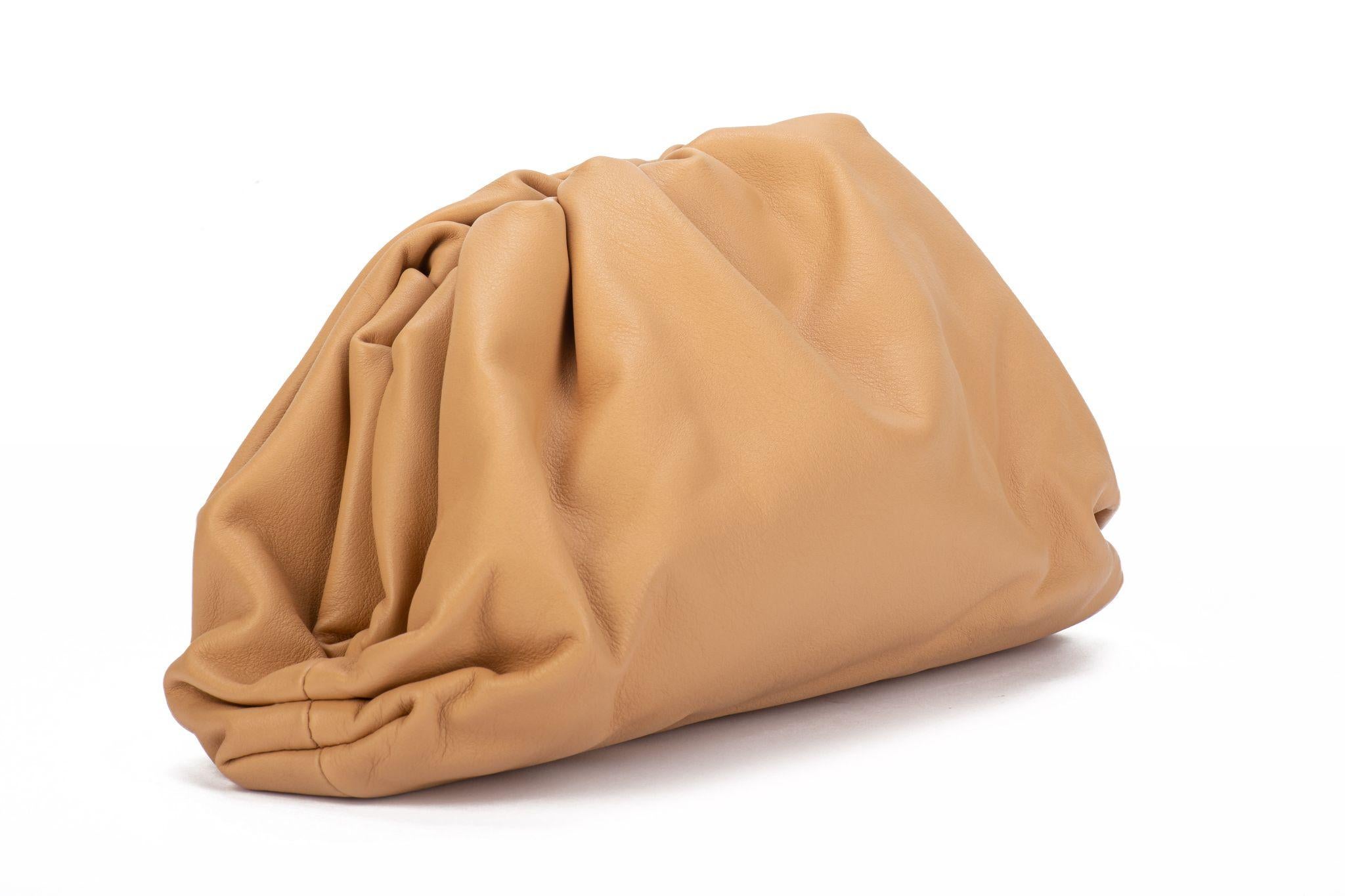 Bottega Veneta new very sought after almond beige teen pouch. Comes with booklet and original dust cover.

