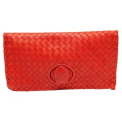 Bottega Veneta Orange Intrecciato Leather Twist Lock Clutch