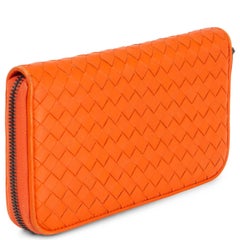 BOTTEGA VENETA orange leather INTRECCIATO ZIP AROUND CONTINENTAL Wallet