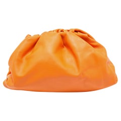Bottega Veneta Orange Leder-Clutch mit Beutel
