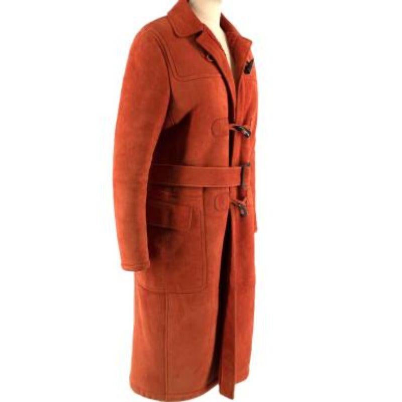 orange duffle coat