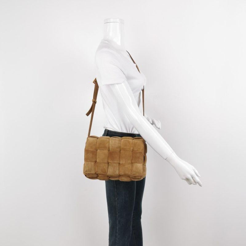 Bottega Veneta Padded Cassette Suede Leather Light Brown Beige
 These are professional photos of the actual bag offered by Luxbags.
 Discover the luxurious craftsmanship of Bottega Veneta with this handwoven black leather Padded Cassette shoulder