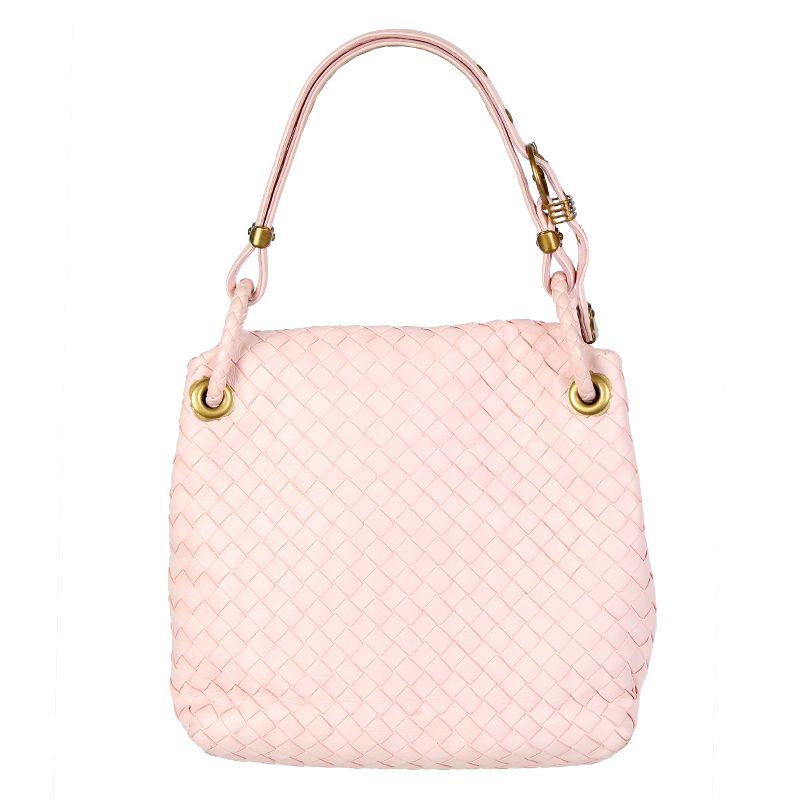 Bottega Veneta flap shoulder bag in woven pale pink leather. Closes with a hidden magnet under the flap. Lined in pale mauve suede with an open pocket against the front and a zipper pocket against the back. Has been carried and is in excellent