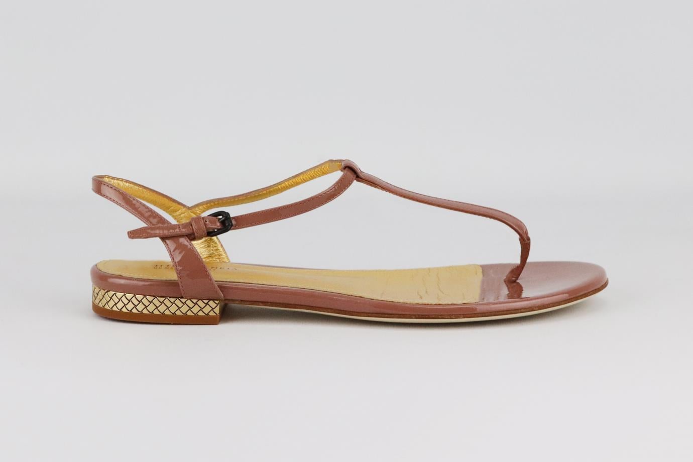 Bottega Veneta patent leather sandals. Pink. Buckle fastening at side. Does not come with box or dustbag. Size: EU 38 (UK 5, US 8). Insole: 9.5 in. Heel: 0.5 in
