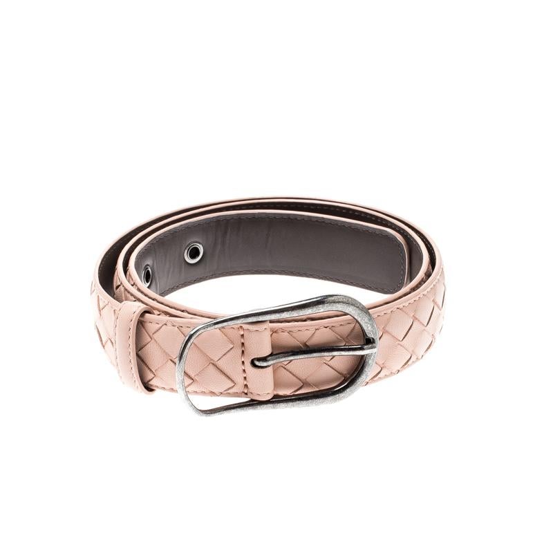 Give your outfit a bold and stylish touch with this Bottega Veneta belt. Made from Intrecciato woven leather, its pink color is contrasted with dark silver-tone eyelets and buckle.

Includes: The Luxury Closet Packaging

The Luxury Closet is an