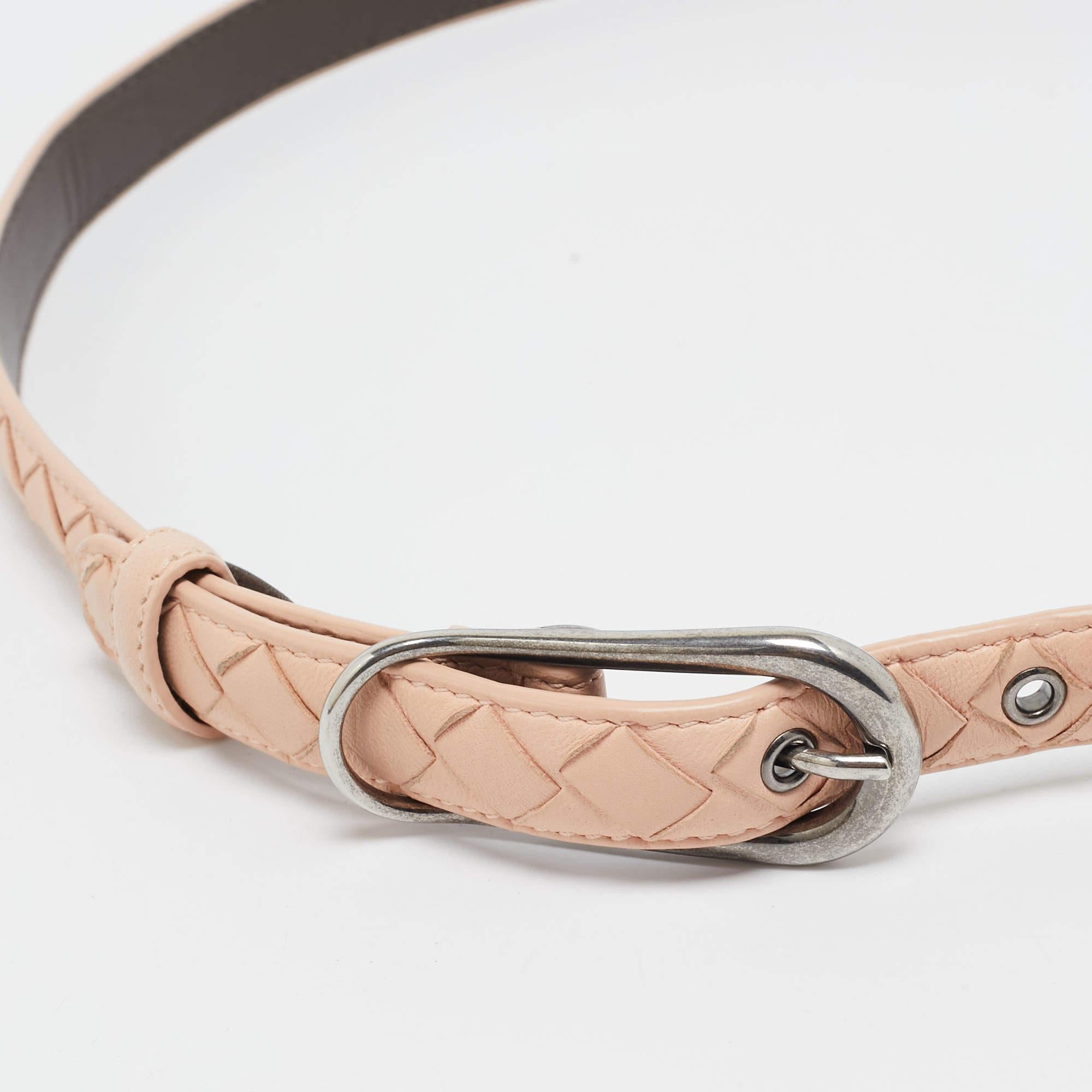 This belt from Bottega Veneta has an appealing design. The designer belt has a sturdy buckle that can be easily fastened and unfastened. The belt is perfect to adorn your waist and for making a style statement.