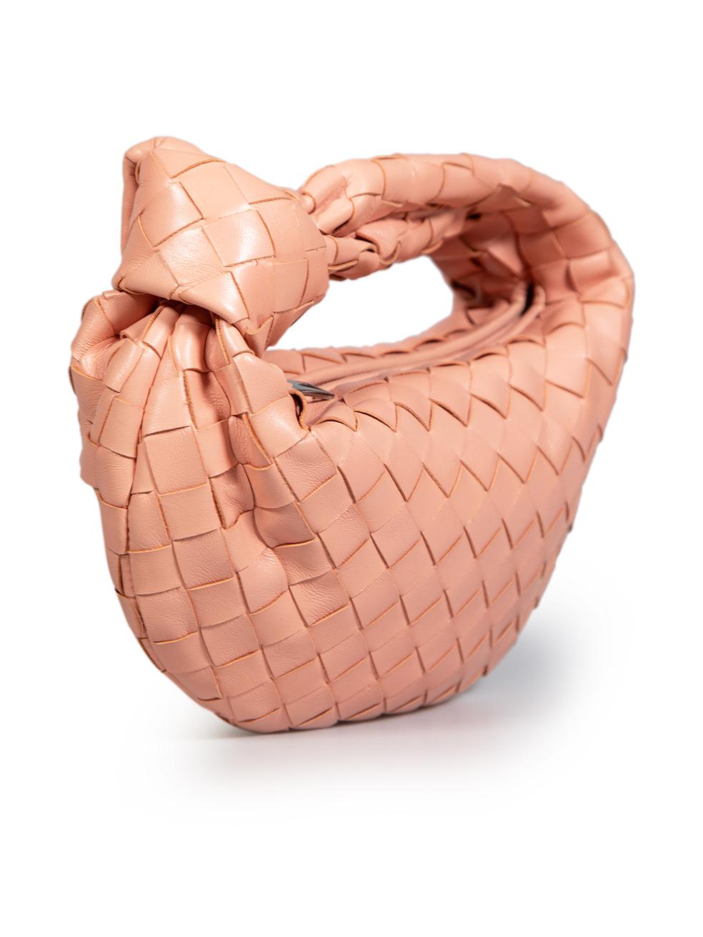 CONDITION is Very good. Minimal wear to bag is evident. Light discolouration on leather trimming near the zipper and on the interior on this used Bottega Veneta designer resale item.
 Details
 Model: Jodie
 Pink
 Leather
 Top handle bag
 1x Handle
