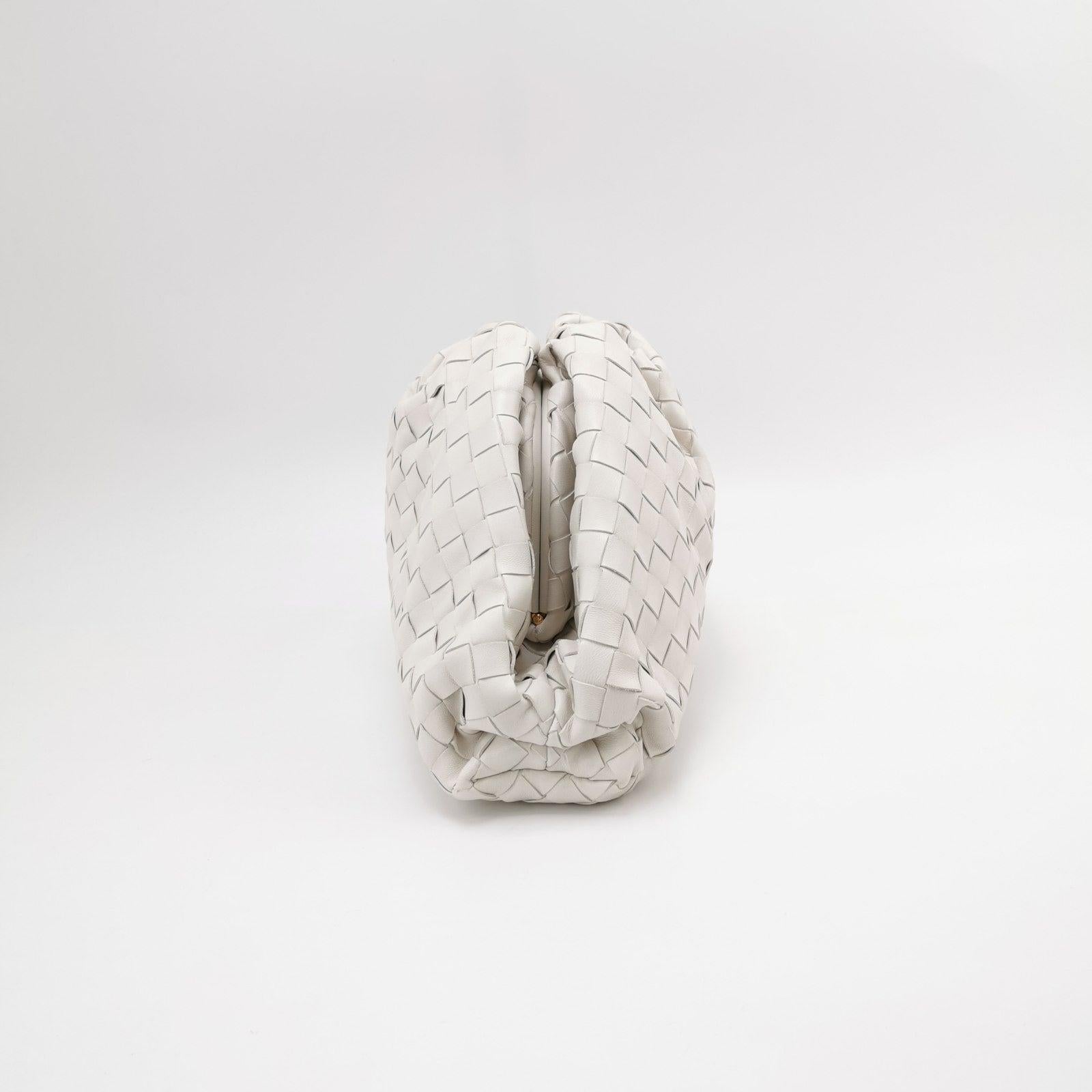 Bottega Veneta Pouch Large Intrecciato White Lambskin Leather Clutch These are professional photos of the actual bag offered by Luxbags. Discover the sophisticated luxury of the Bottega Veneta Pouch. Revel in its stylish cult design, handcrafted in