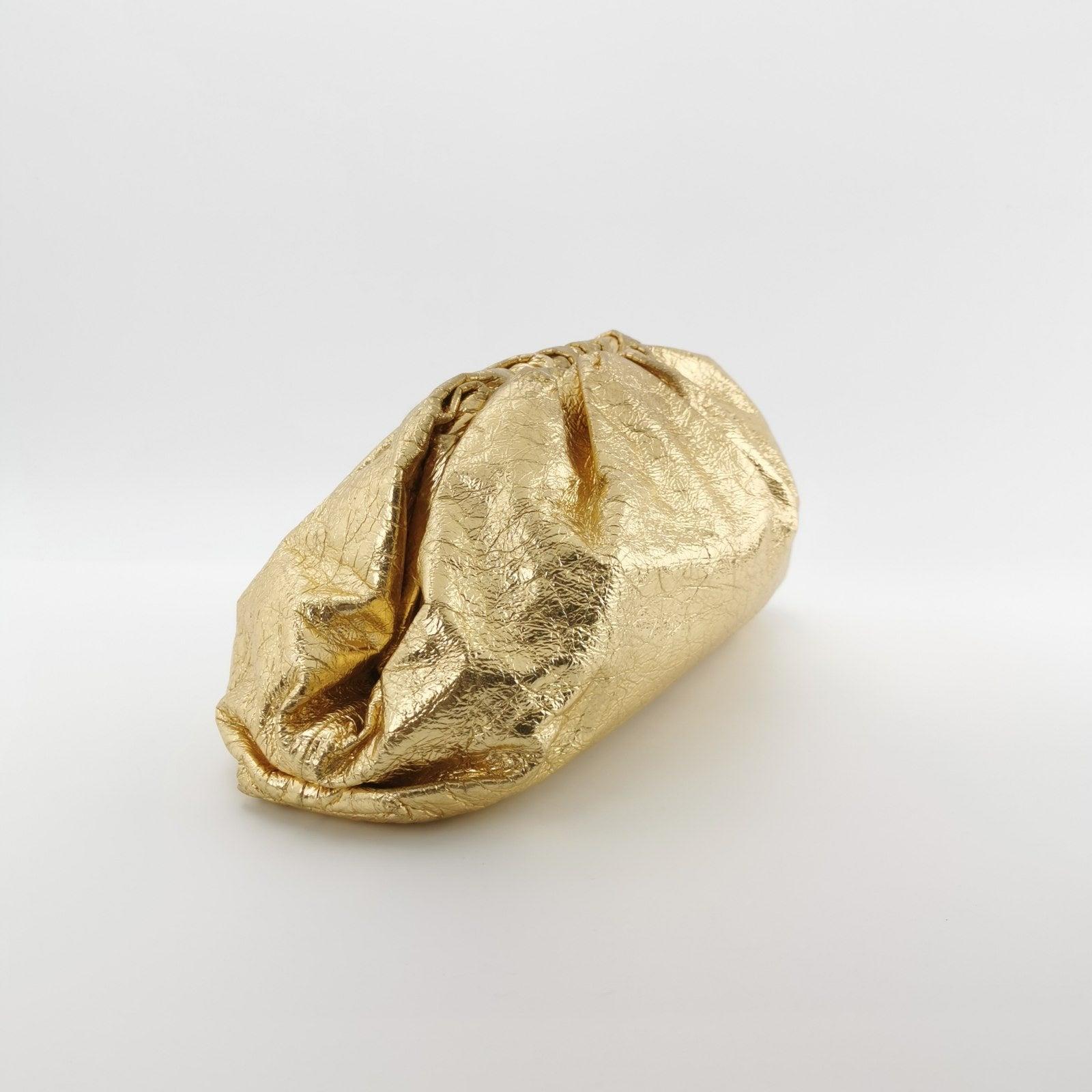Bottega Veneta Pouch Large Metallic Gold Wrinkled Leather
These are professional photos of the actual bag.
  Discover the sophisticated luxury of the Bottega Veneta Pouch. Revel in its stylish cult design, handcrafted in a luxurious lambskin