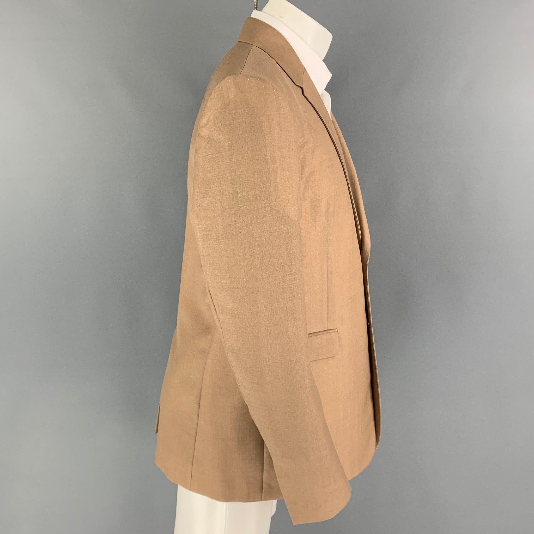 BOTTEGA VENETA Pre-Fall 2019 sport coat comes in a khaki mohair / wool with a full liner featuring a notch lapel, flap pockets, single back vent, and a double button closure. Made in Italy.
Excellent
Pre-Owned Condition. 

Marked:   50