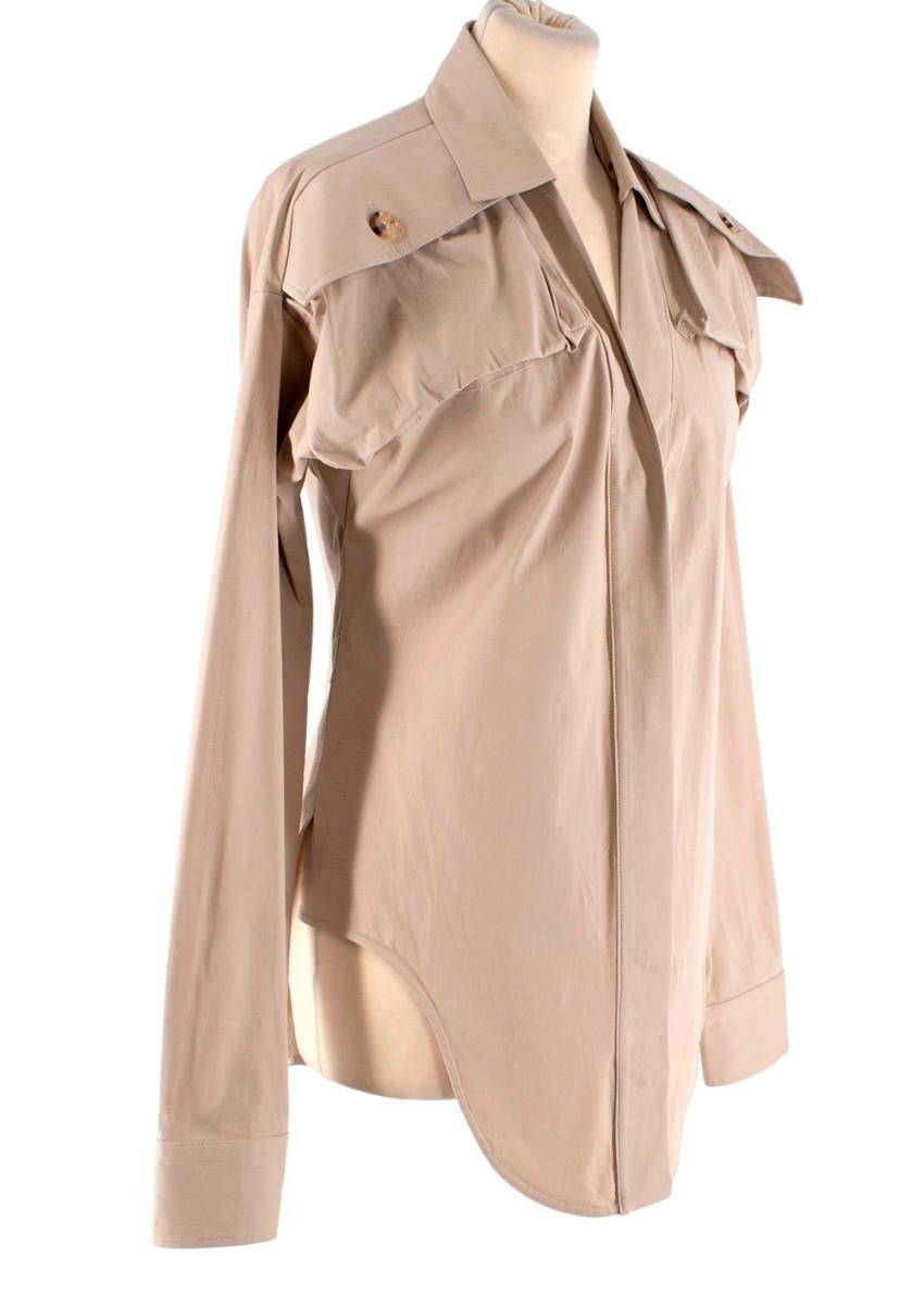  Bottega Veneta Pre Spring Stretch Cotton Safari Shirt

- Inspired by army styles
- Cut for a slim fit
- Point collar
- Buttoned cargo pockets on the shoulders
- Concealed fastenings
- Curved hem 

Materials:
96% Cotton
4% Elastane

Made in