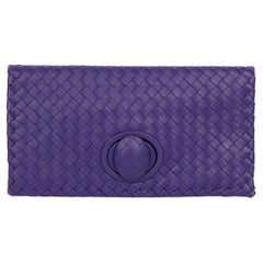 Pochette à fermeture tournante en cuir nappa tressé Intrecciato violet Bottega Veneta