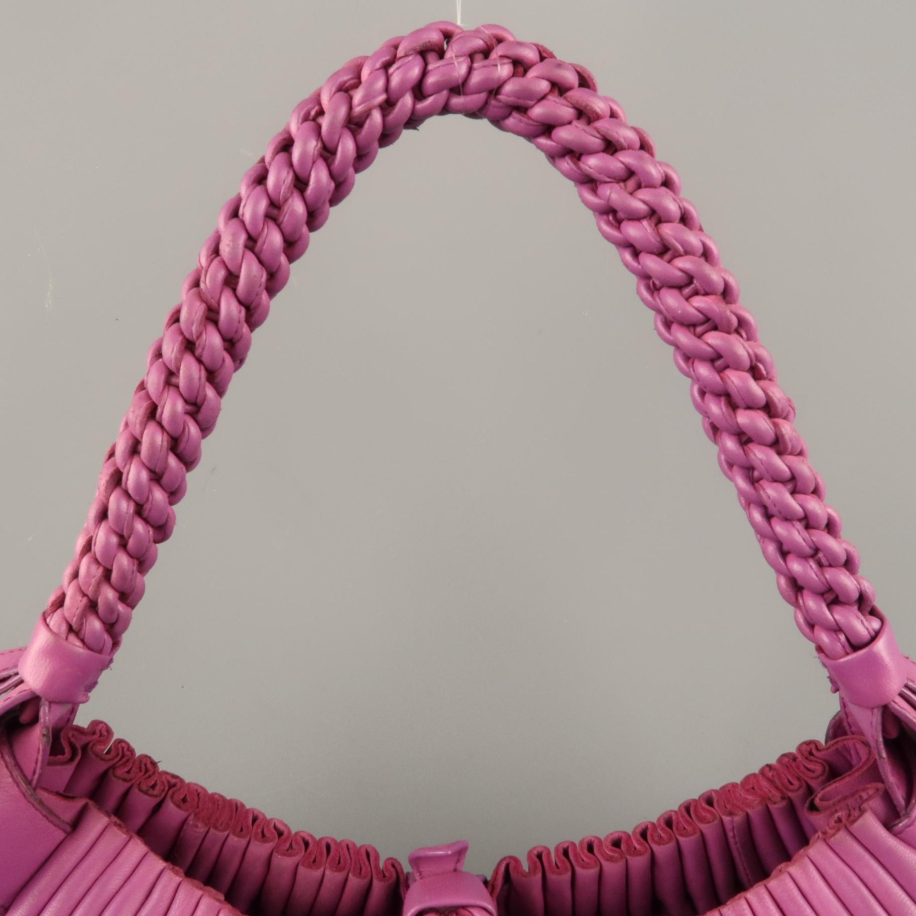 Vintage BOTTEGA VENETA shoulder bag comes in purple leather with a gathered base. braided woven handle, and snap tab closure with flower appliques. Wear throughout. As-is. Made in Italy.
 
Good Pre-Owned Condition.
 
Measurements:
 
Length:13