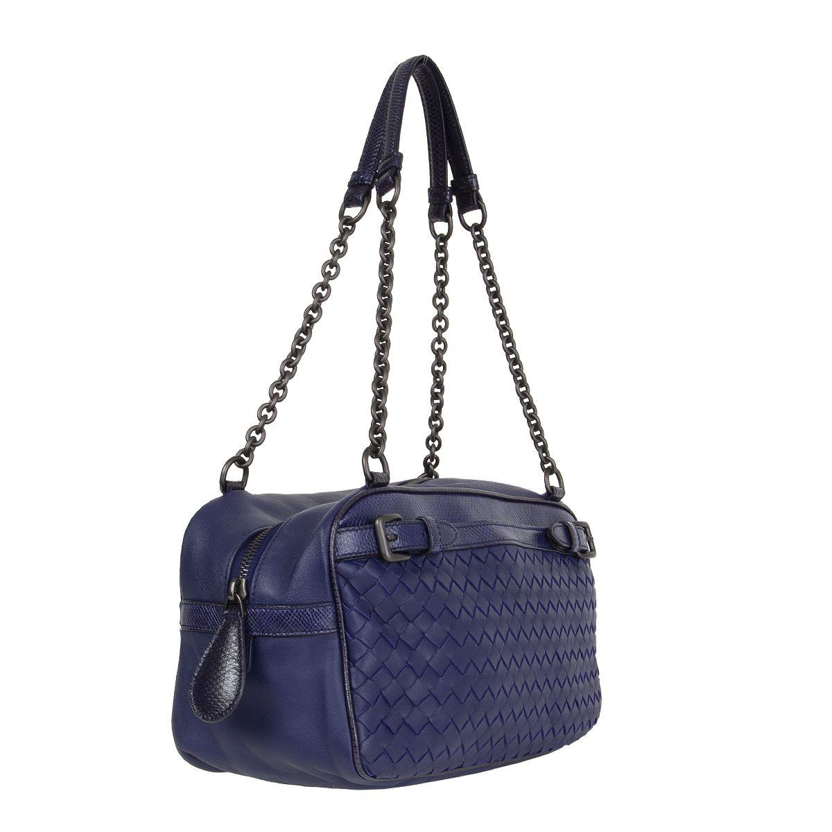 100% authentic Bottega Veneta shoulder bag in deep purple Intrecciato lambskin featuring karung snakeskin details. Front pocket with magnetic closure and two decorative buckles on the side. Opens with a zipper on top and is lined in dark taupe