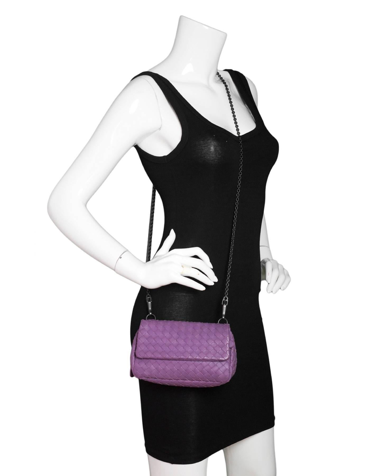 Bottega Veneta Purple Nappa Intrecciato Small Chain Crossbody

Made In: Italy
Color: Purple
Hardware: Dark grey
Materials: Leather, metal
Lining: Taupe suede
Closure/Opening: Flap top with side snaps
Exterior Pockets: Zip pocket under flap, zip