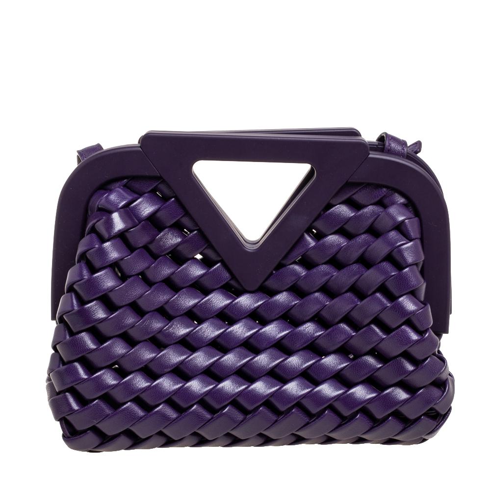 This Bottega Veneta Point shoulder bag presents an artistic weave design through the use of purple leather. It has a frame top, a lined interior, and an adjustable shoulder strap. Make it part of your modern wardrobe.

Includes: Original Dustbag
