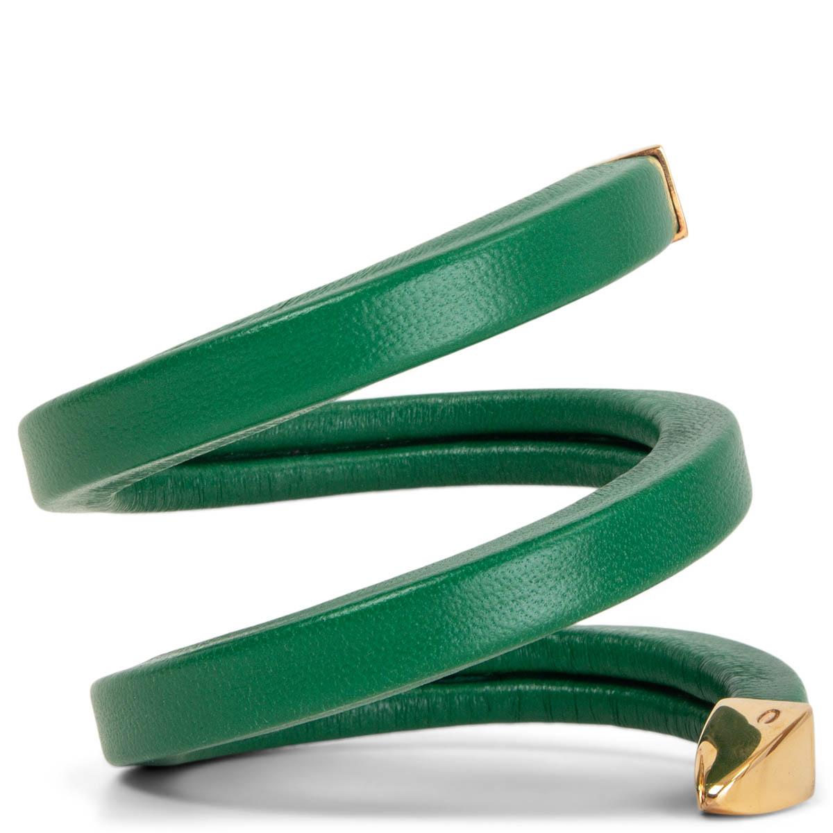 100% authentic Bottega Veneta cuff bracelet in green lamb leather that will sit softly against your skin, this wrap-around style is tipped on both ends with gold-plated sterling silver. Brand new. Comes with dust bag. 

Measurements
Depth	1cm