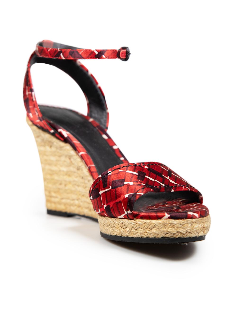 CONDITION is Verygood. Minimal wear to sandals is evident. There are light abrasions along the heel ends. There is a small amount of fraying along the ankle straps on this used Bottega Veneta designer resale item.
 
 
 
 Details
 
 
 Red
 
 Cloth