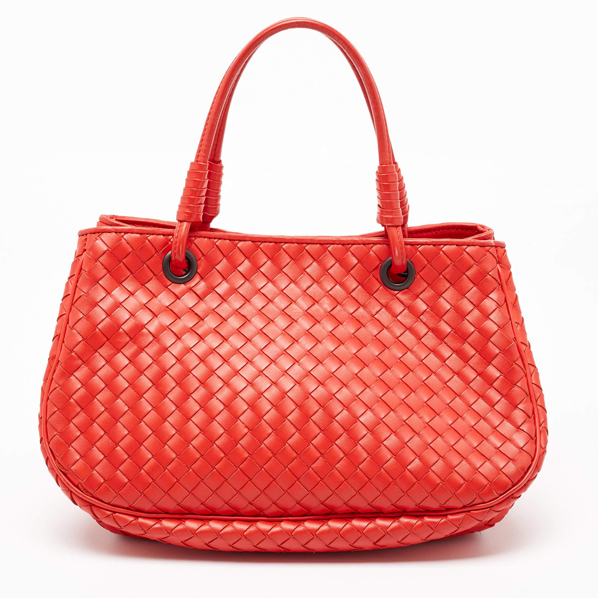 Indulge in timeless luxury with this Bottega Veneta bag for women. Meticulously crafted, this exquisite accessory embodies elegance, functionality, and style, making it the ultimate companion for every sophisticated woman.


