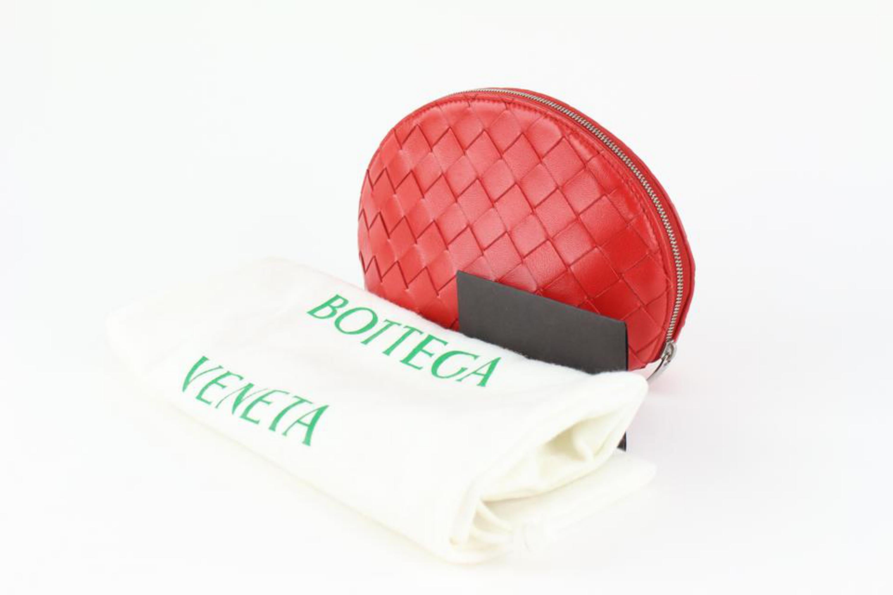 Bottega Veneta Red Intrecciato Leather Oval Cosmetic Pouch Toiletry Case 1123bv33
Date Code/Serial Number: B08642914P
Made In: Italy
Measurements: Length:  8