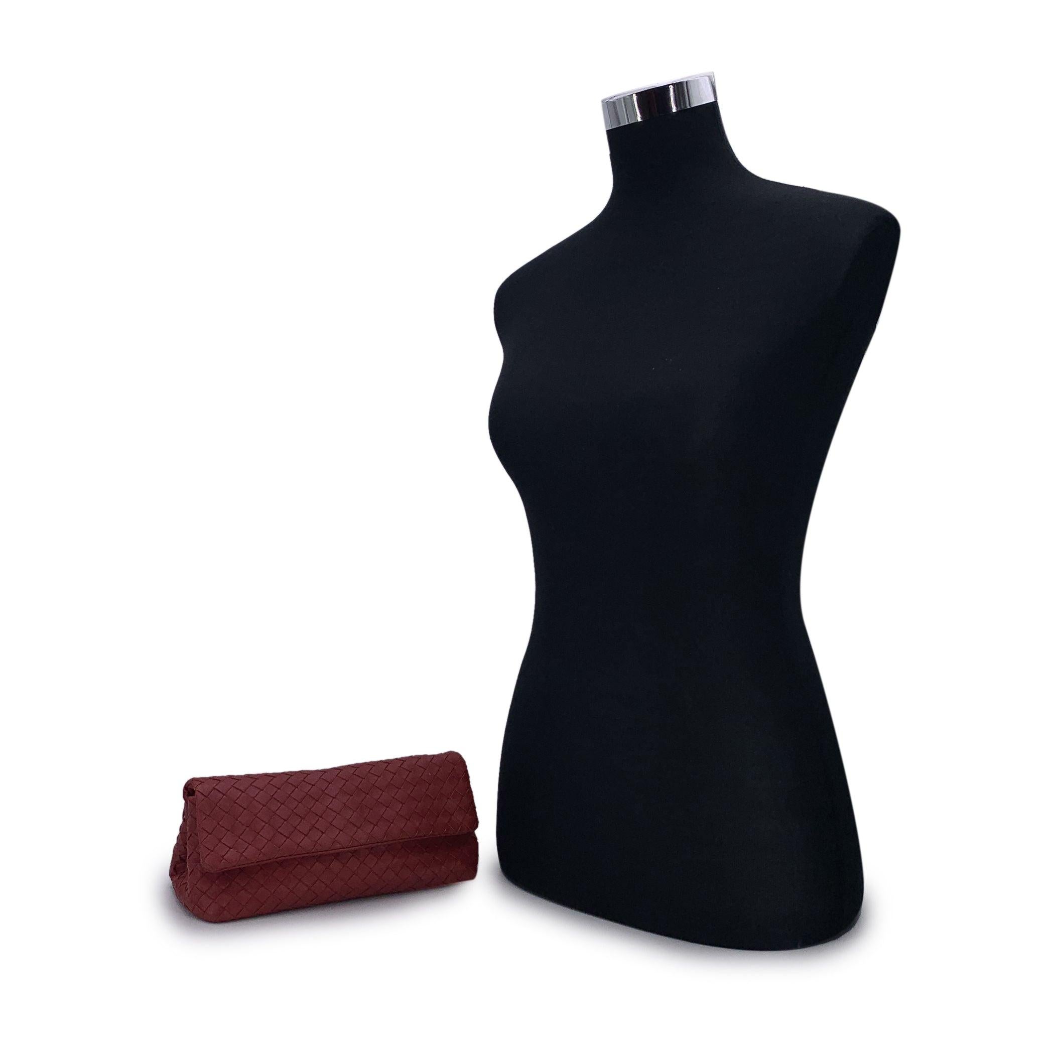 Bottega Veneta red woven Intrecciato clutch pochette bag. Magnetic button closure on top. Beige suede lining with 1 middle zip pocket. 'Bottega Veneta - Made in Italy' engraved inside. Authenticity certificate label inside. Condition A - EXCELLENT