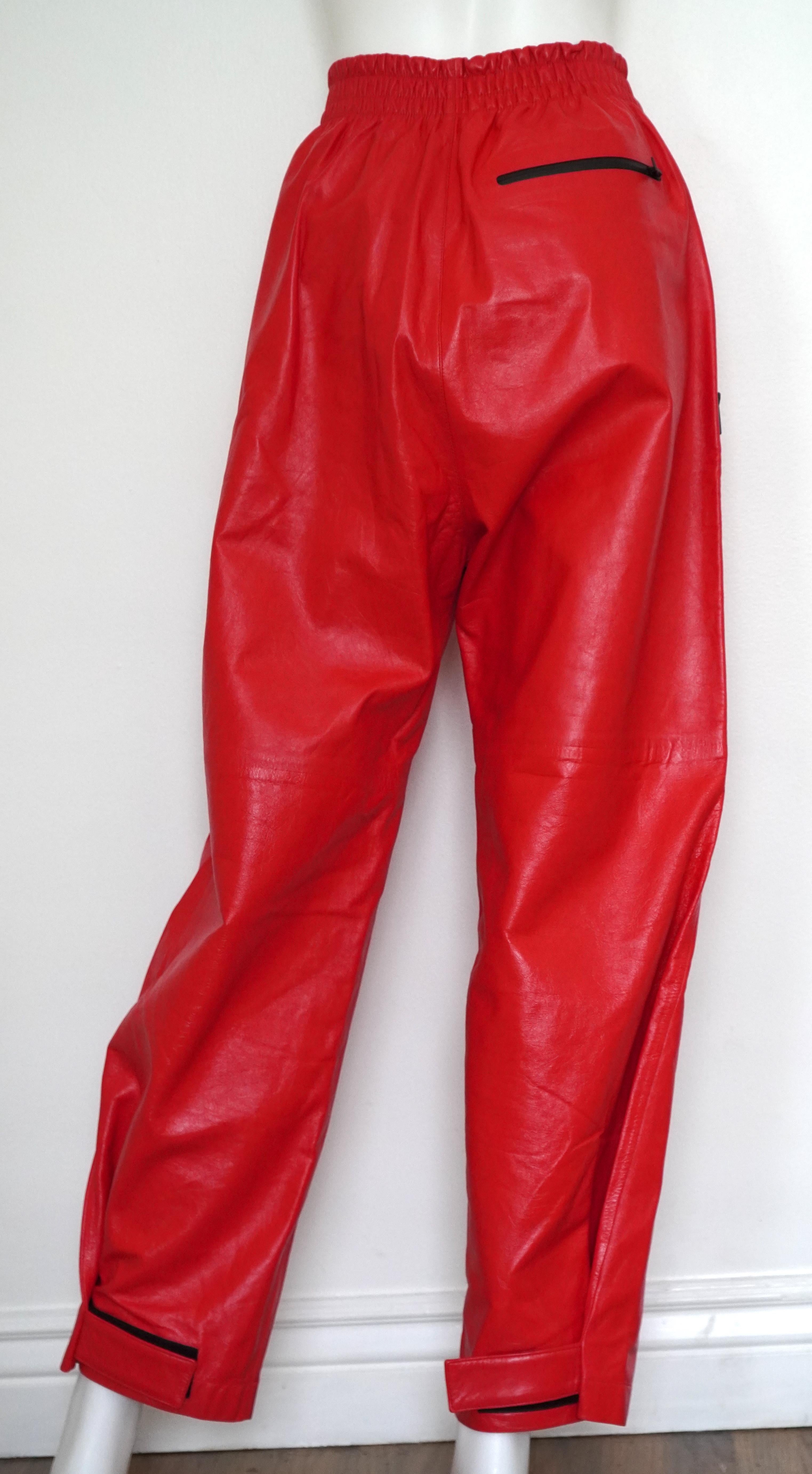 NEW Bottega Veneta red leather pants. Pair these loose fitting Italian made pants with a form fitting top to complete your look.
Product details
• Shiny leather pants
• Elasticated waistband
• Zipped pockets at sides and slip pocket on back
•