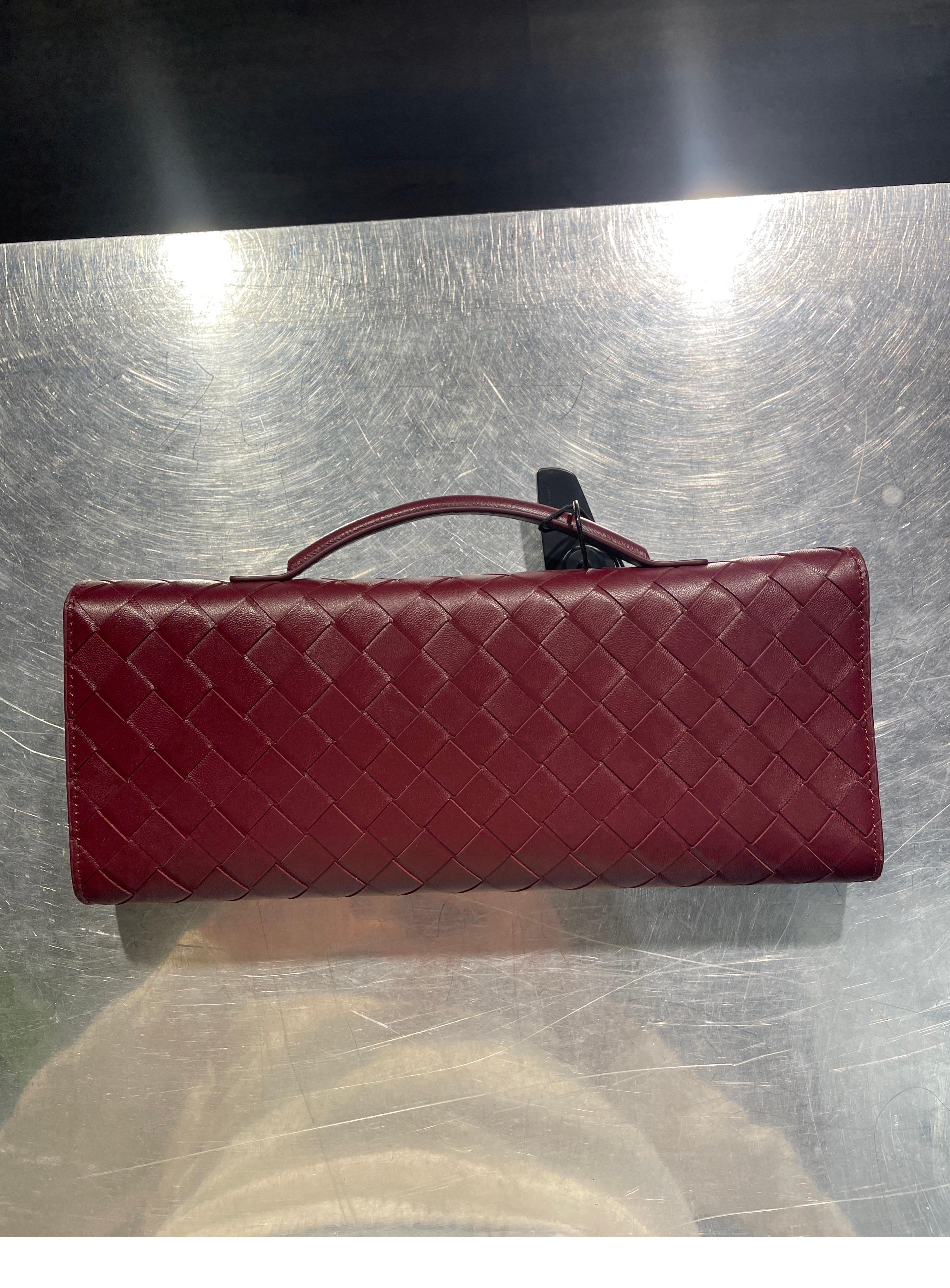 Brown BOTTEGA VENETA RED LONG ANDIAMO CLUTCH HANDLE 2023 bag Barolo