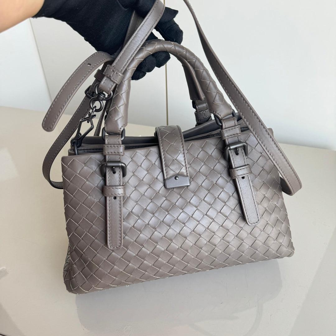 Bottega Veneta Roma Handbag Bag Intrecciato Nappa Leather Grey Large Mini 25cm
 These are professional photos of the actual bag offered by Luxbags.
 This Bottega Veneta Roma Bag is an exceptional piece of luxury, crafted from iconic grey leather