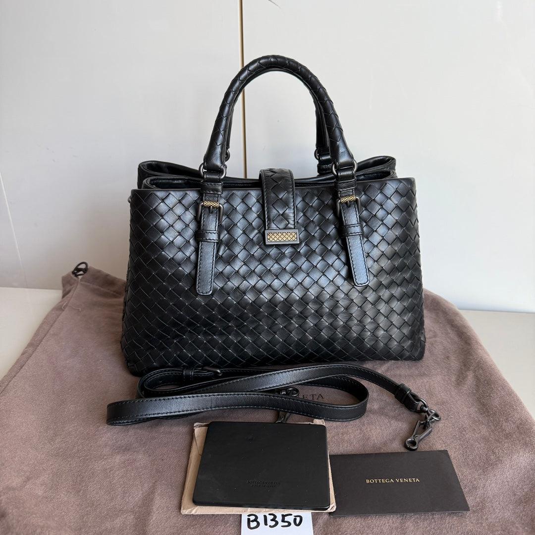 Bottega Veneta Roma Handbag Intrecciato Nappa Leather Black Small 30cm
 These are professional photos of the actual bag offered by Luxbags.
 This Bottega Veneta Roma Bag is an exceptional piece of luxury, crafted from iconic dark brown leather with