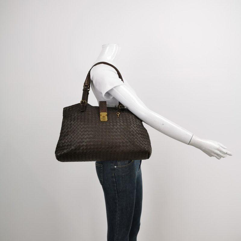 Bottega Veneta Roma Tote Intrecciato Lambskin Leather Dark Chocolate Brown 40cm
 These are professional photos of the actual bag.
 This Bottega Veneta Roma Bag is an exceptional piece of luxury, crafted from iconic black leather with the instantly