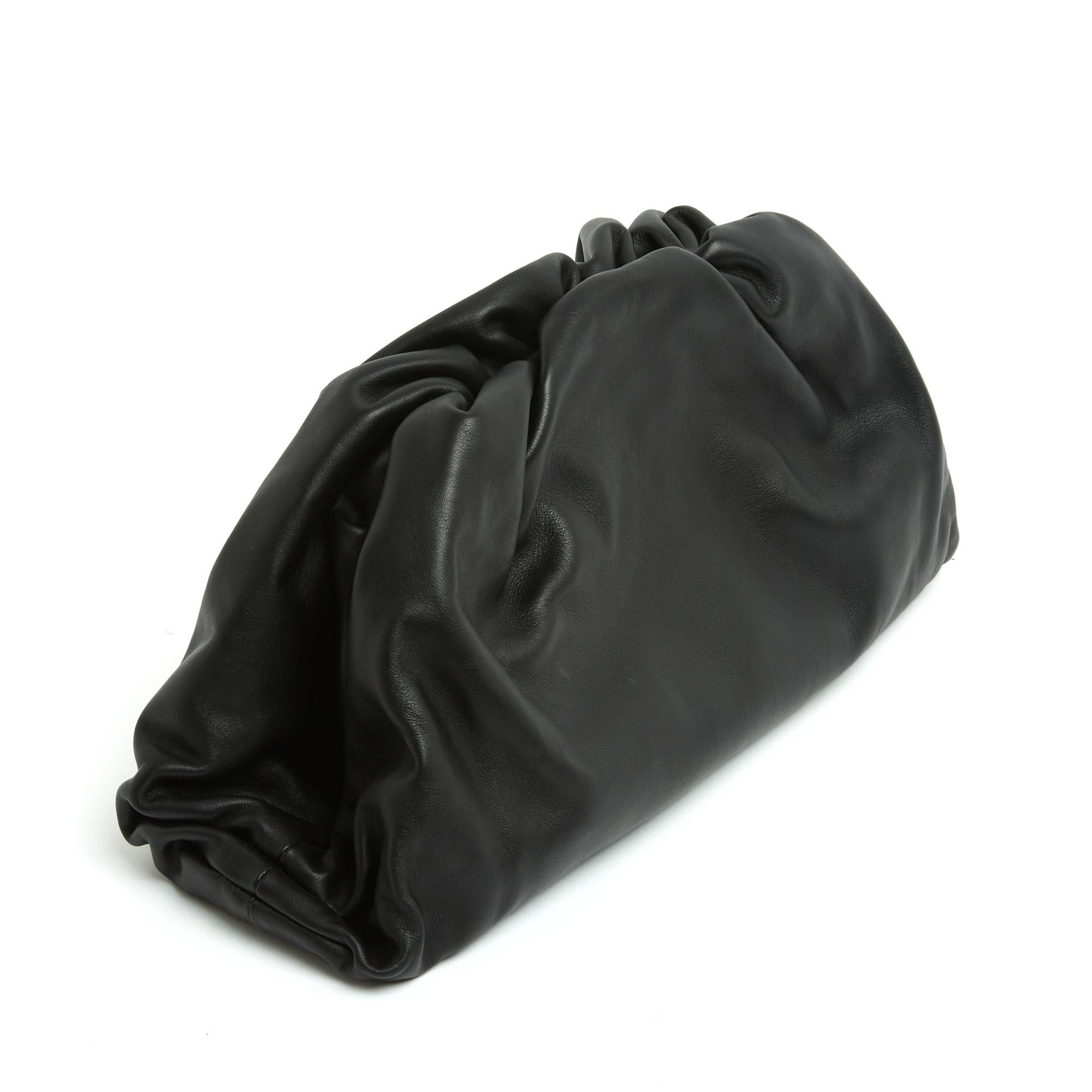 Bottega Veneta Pouch bag, Maxi size, in smooth and draped black leather, magnetic clasp covered in leather, black leather interior, silver metallic finishes, hand-carried, year 2024. Width 40 cm x height 18 cm x depth 18 cm. The bag comes from