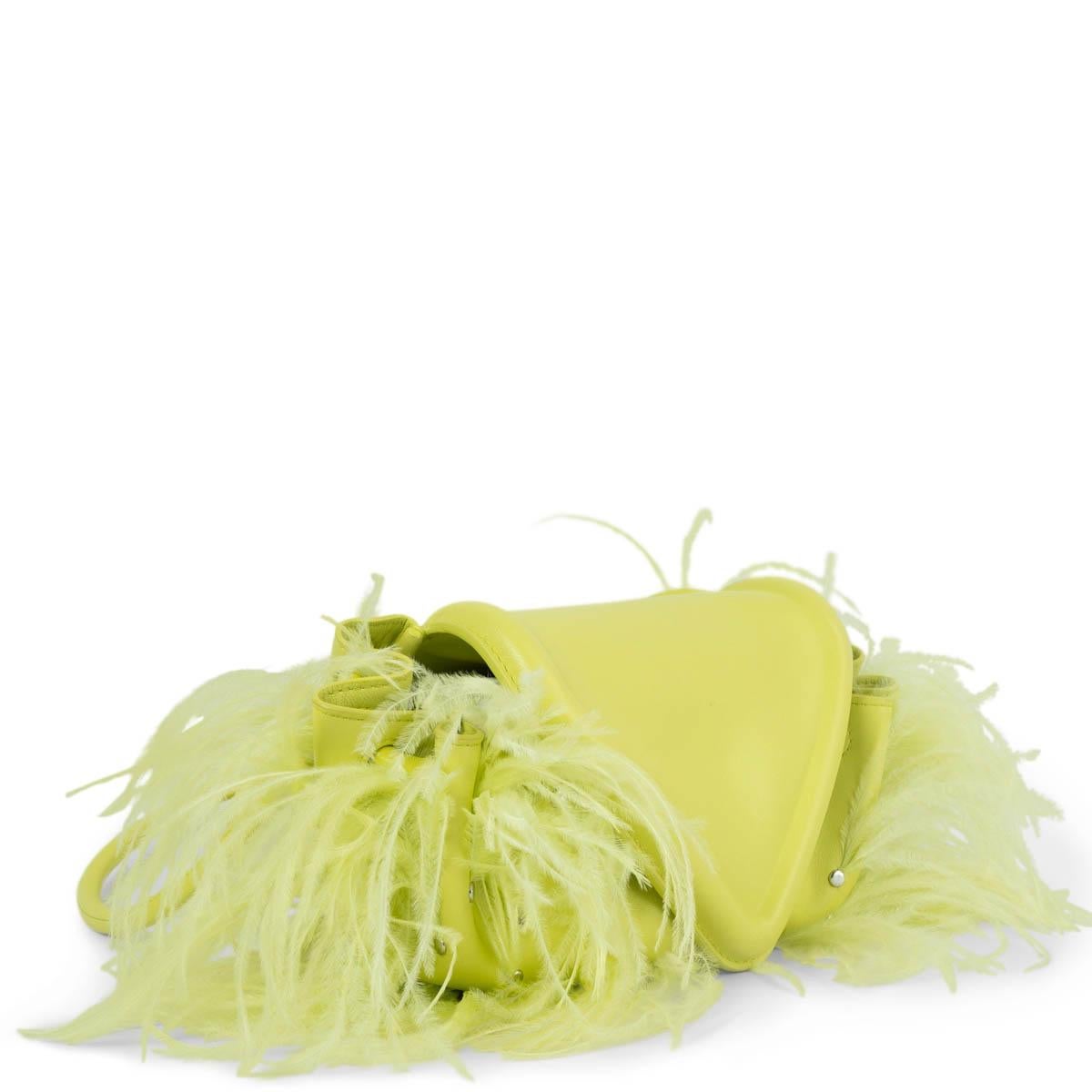 100% authentic Bottega Veneta Beak clutch or shoulder bag. The design is covered in wispy ostrich feathers that create beautiful movement. It's made from Seagrass (chartreuse green) leather in a slouchy silhouette with a triangular front flap and