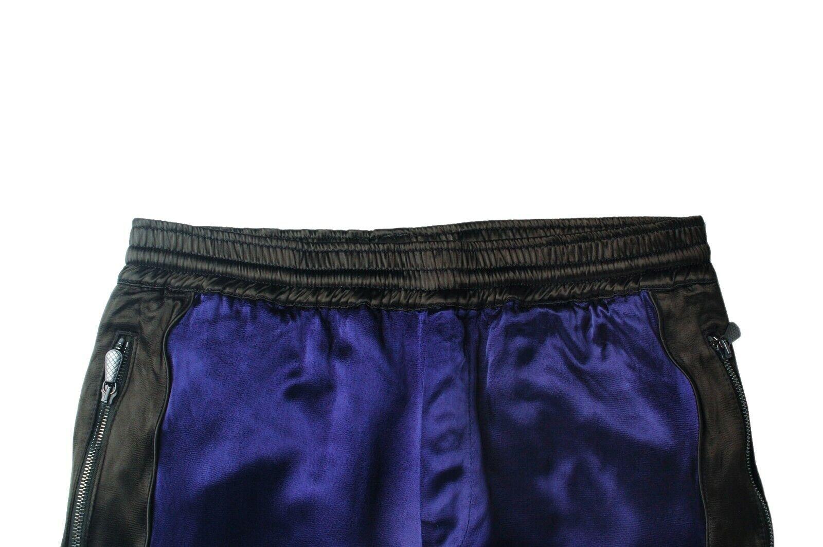 Item for sale is 100% genuine Bottega Veneta Shiny Zippers on Leg Openings Men Track Pants
Color: Dark Purple
(An actual color may a bit vary due to individual computer screen interpretation)
Material: 100% viscose (lining linen and cotton)
Tag