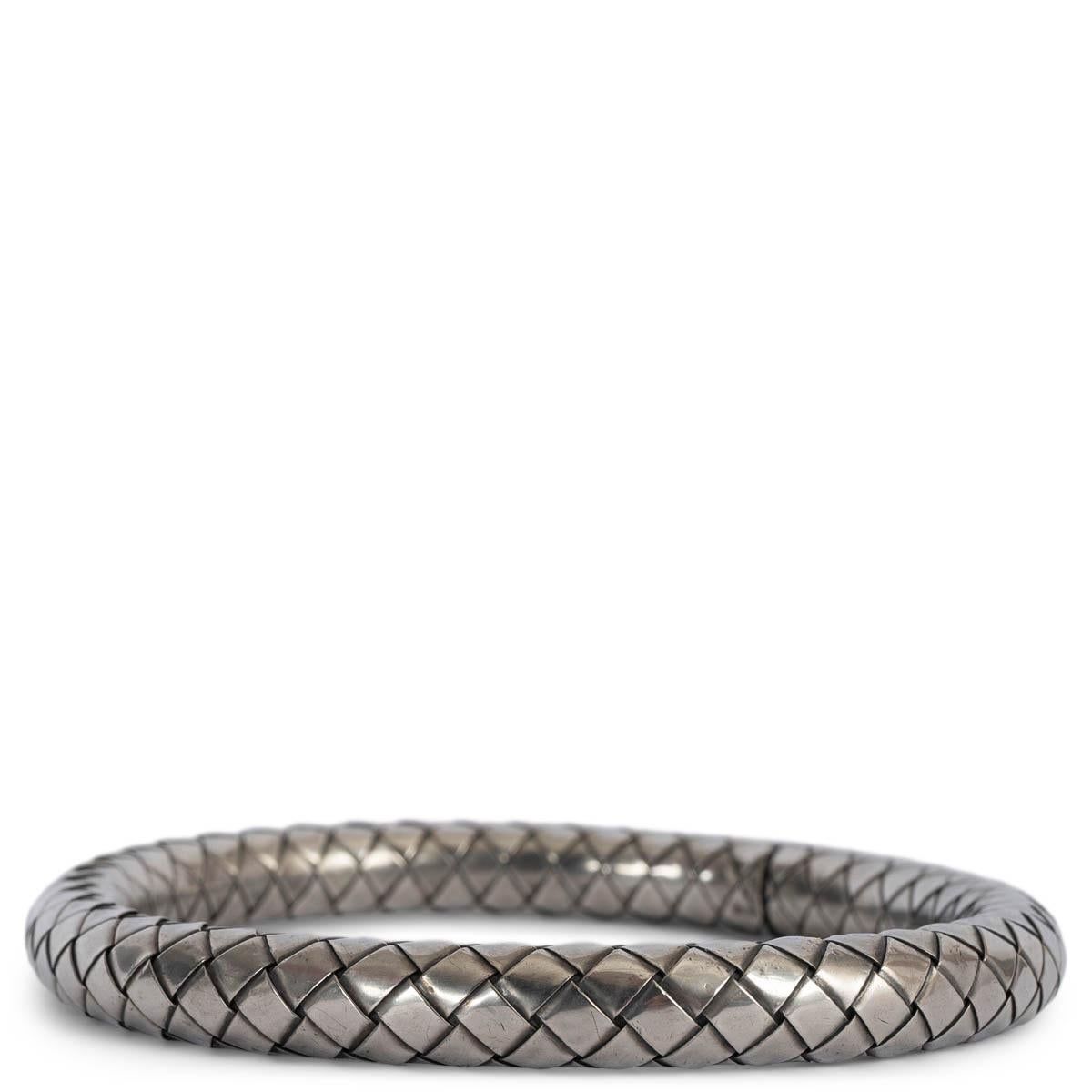 100% authentic Bottega Veneta Intrecciato bangle bracelet in antiqued sterling silver. Continuous hand woven design. Has been worn and is in excellent condition. 

Measurements
Width	0.8cm (0.3in)
Circumference	19cm (7.4in)
Hardware	Antique Sterling