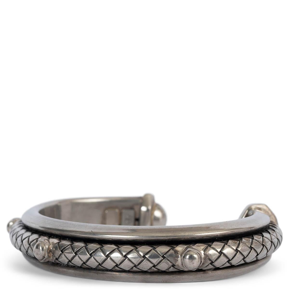 100% authentic Bottega Veneta Intrecciato cuff in antiqued sterling silver with hand woven second layer and rivets. Has been worn and is in excellent condition. 

Measurements
Width	1.3cm (0.5in)
Circumference	16cm (6.2in)

All our listings include