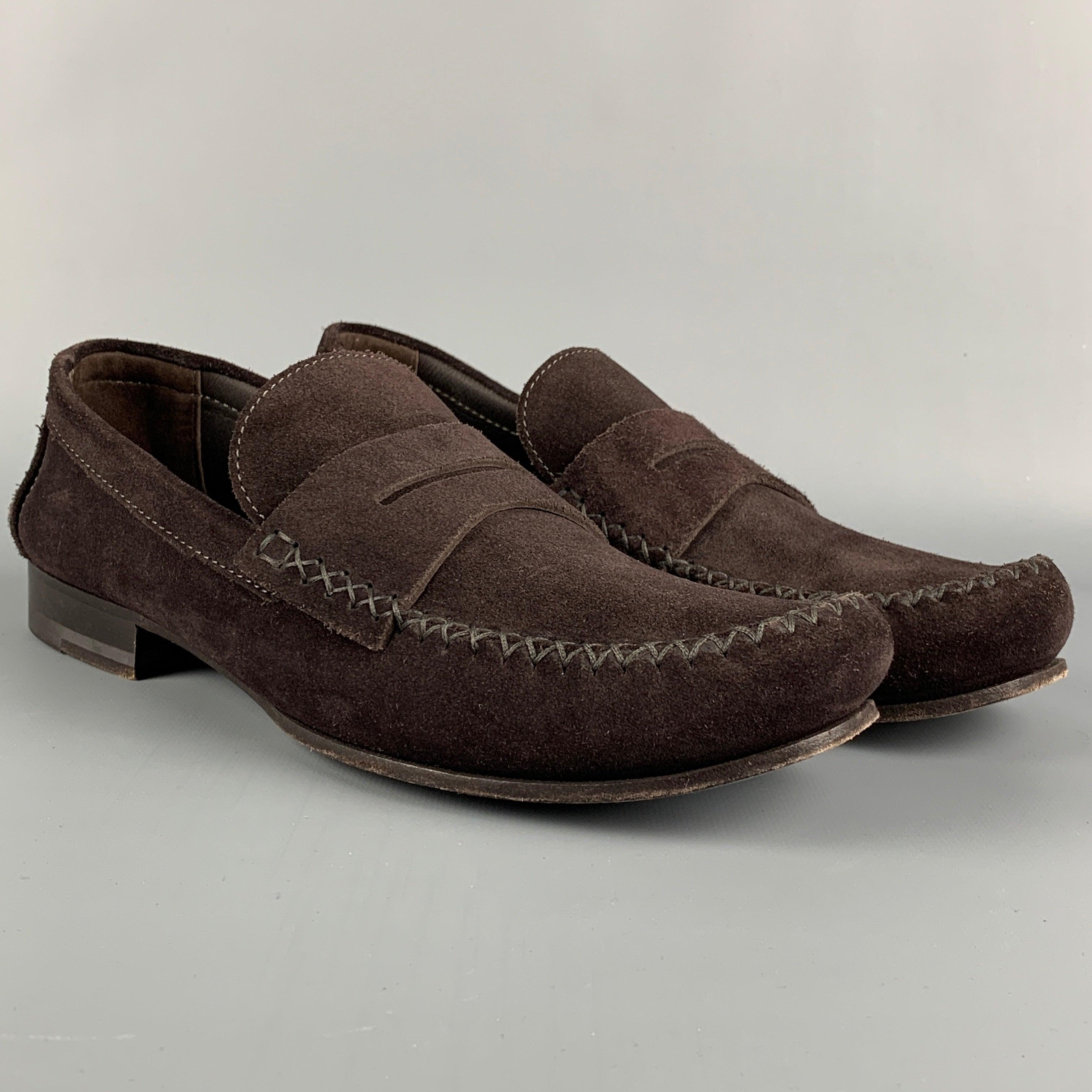 BOTTEGA VENETA loafers comes in a brown suede featuring a penny strap, signature woven detail, and a slip on style. Made in Italy.Very Good
 Pre-Owned Condition. 
 

 Marked:  43Outsole: 11.5 inches x 4 inches 
  
  
  
 Sui Generis Reference: