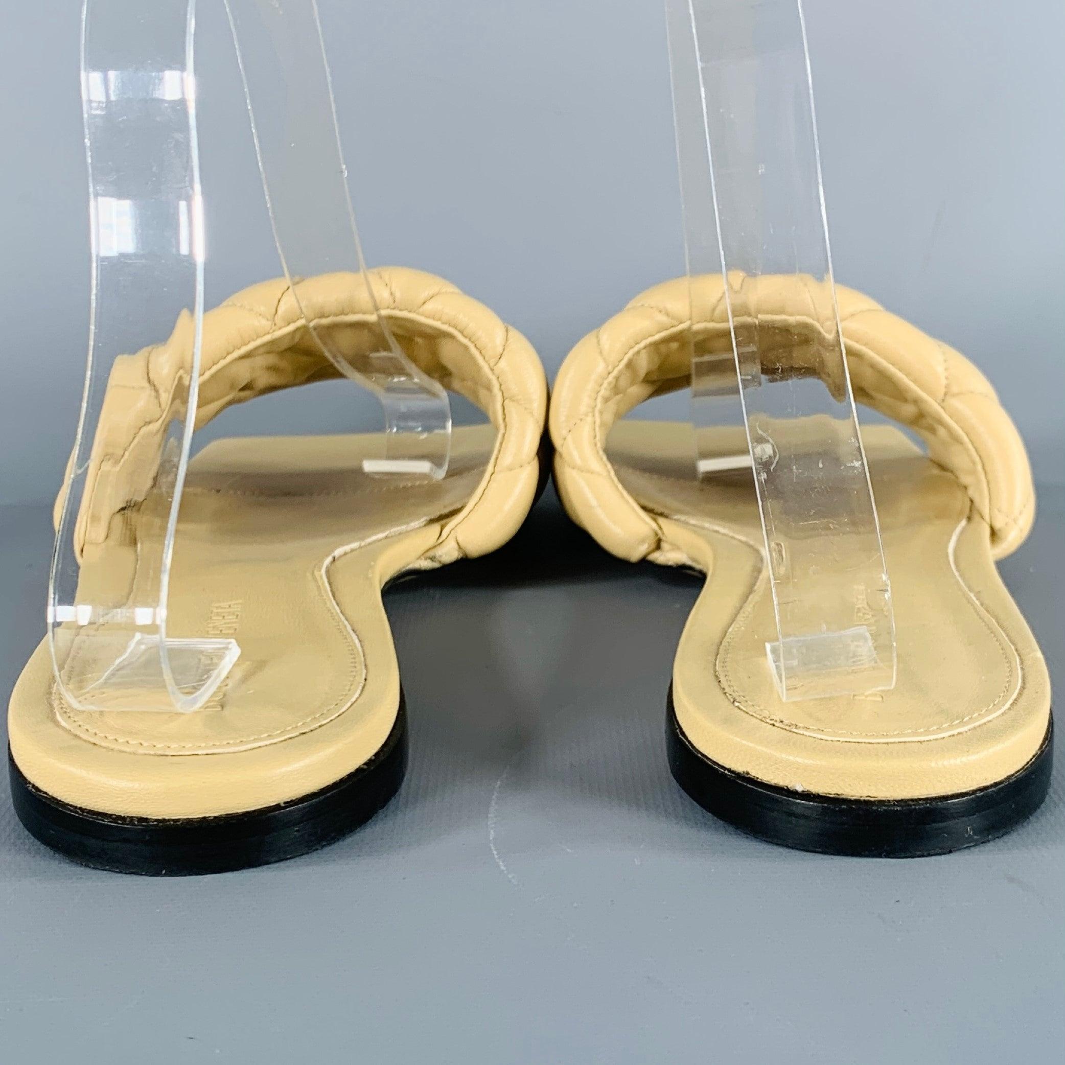 BOTTEGA VENETA sandals in a tan leather featuring a slides style, quilted design, and square toe. Made in Italy.Excellent Pre-Owned Condition. 

Marked:   40Outsole: 10.5 inches  x 3.75 inches 

  
  
 
Sui Generis Reference: 132855
Category: