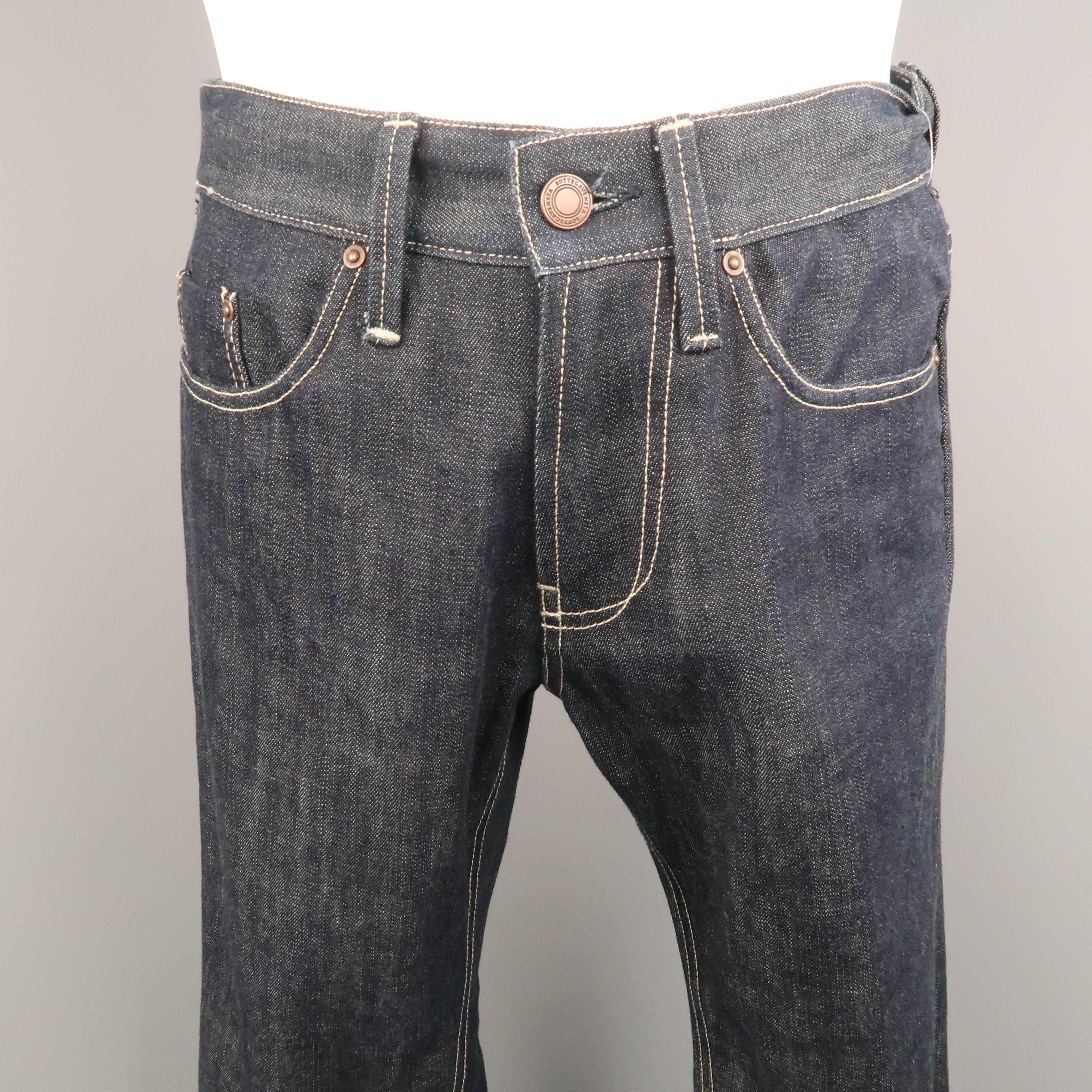 BOTTEGA VENETA jean comes in a indigo denim featuring white contrast stitching, zip fly, and a back pocket embroidery patch. Made in Italy.
 
Excellent Pre-Owned Condition.
Marked: IT 44
 
Measurements:
 
Waist: 30 in.
Rise: 10 in.
Inseam: 30 in.