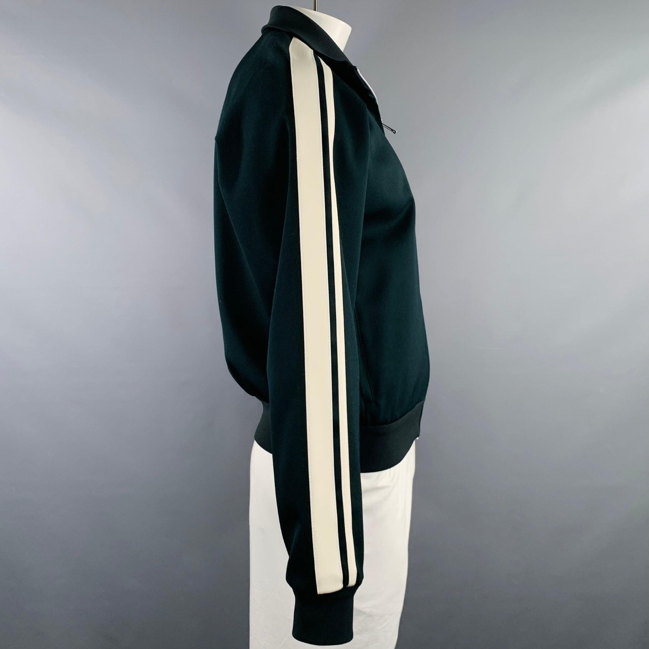 BOTTEGA VENETA jacket
in a
green wool stretch blend fabric featuring a track style, white side stripes, and zip up closure. Made in Italy.Excellent Pre-Owned Condition. 

Marked:   M 

Measurements: 
 
Shoulder: 16.5 inches Chest: 42 inches Sleeve: