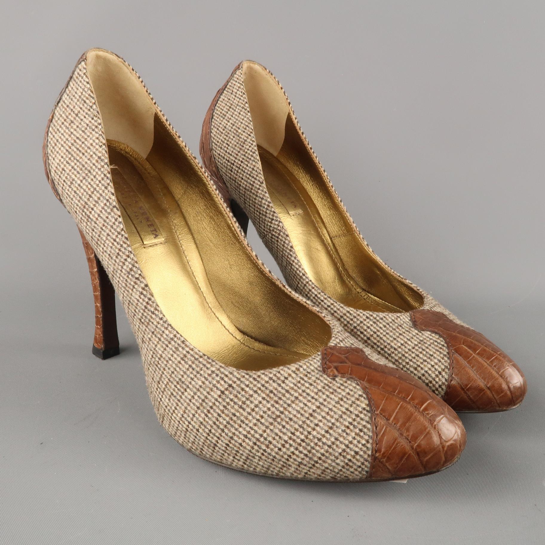 BOTTEGA VENETA pumps come in beige micro houndstooth print fabric with a pointed alligator leather panel toe and covered leather heel. Made in Italy.
 
Original retail price: $725.00
New without Tags.
Marked: IT 36.5
 
Measurements:
 
Heel: 4 in.