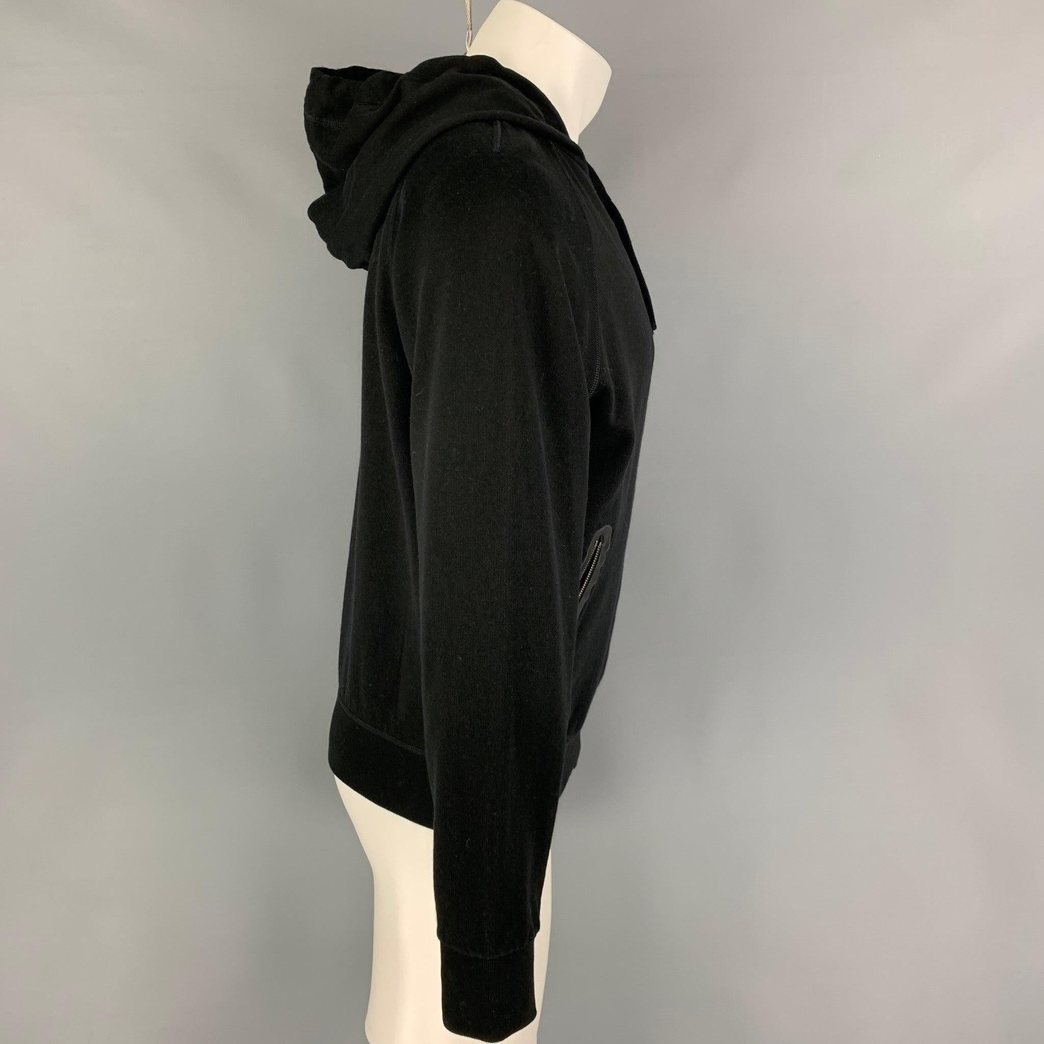 BOTTEGA VENETA sweatshirt comes in a black cotton / wool featuring a hooded style, leather trim, zipper pockets, and a full zip up closure. Made in Italy.
Excellent
Pre-Owned Condition. 

Marked:   50 

Measurements: 
 
Shoulder: 16 inches Chest: 40
