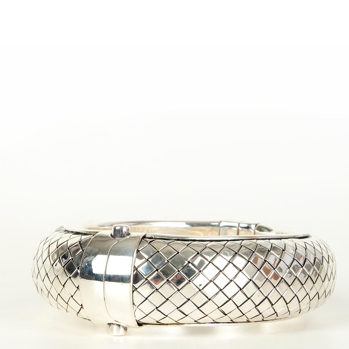 Bottega Veneta silver bracelet handmade using the label's signature Intrecciato techniques. Opens with a push clasp fastening. Has been worn and is in excellent condition. Comes with dust bag and box. 

Tag Size M 
Circumference 19cm