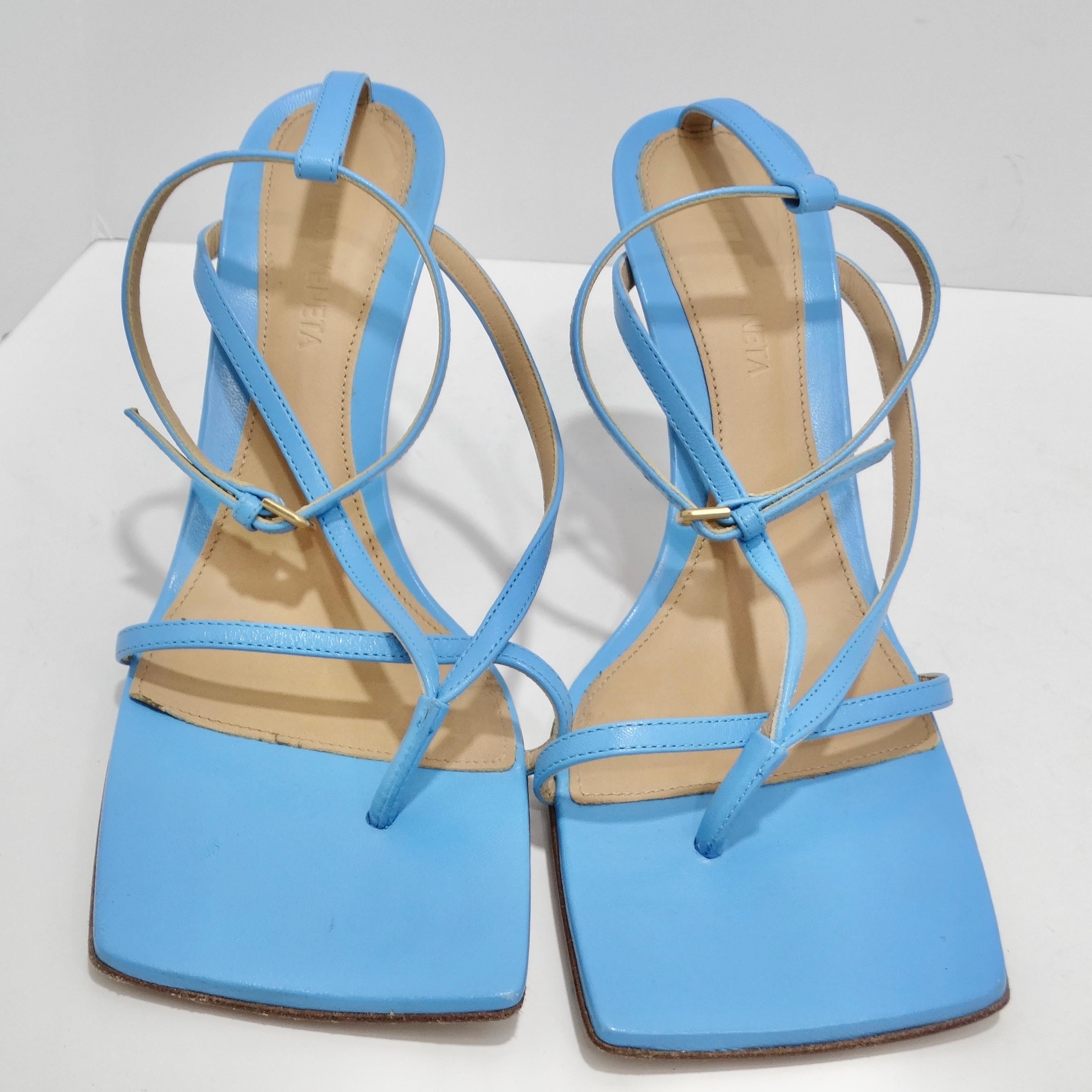 Elevate your footwear game with the Bottega Veneta Stretch Square Toe Leather Sandals in a stunning shade of sky-blue. Crafted with precision and style in mind, these sandals are a true embodiment of Bottega Veneta's minimalist design philosophy